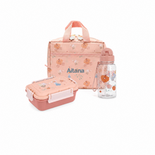 Load image into Gallery viewer, A pink personalized lunch bag set with a matching bento box and water bottle, featuring a floral pattern and the name 'Aitana' printed on the bag, shown on a white background.