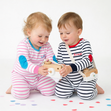 Load image into Gallery viewer, Two children playing with a wooden toy on a white background