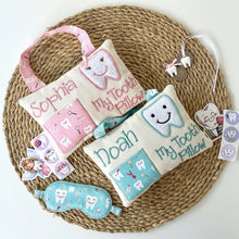 Load image into Gallery viewer, Two personalized tooth pillow toys with embroidered names on a white background
