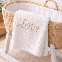 Load image into Gallery viewer, White textured blanket with 'Lottie' embroidery on a wicker crib