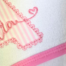 Load image into Gallery viewer, Close-up of a white towel with pink decorative border and text.