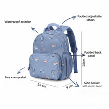 Load image into Gallery viewer, A light blue backpack with a whimsical hot air balloon and bird pattern, shown with dimension labels and callout arrows indicating its measurements (25 cm, 9 cm, 28 cm) and features like a padded back panel and waterproof exterior.