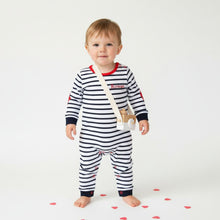 Load image into Gallery viewer, Baby wearing a striped outfit with suspenders on a white background