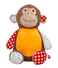 Load image into Gallery viewer, Brown patchwork Monkey Soft toy. He has one multicoloured polka dot ear, arm and foot, the other Ear, arm and foot is red with large polka dot. he has a brown corduroy body with an orange belly that can be personalised with any message using embroidery. He has small embroidered black eyes and a big cheeky smile